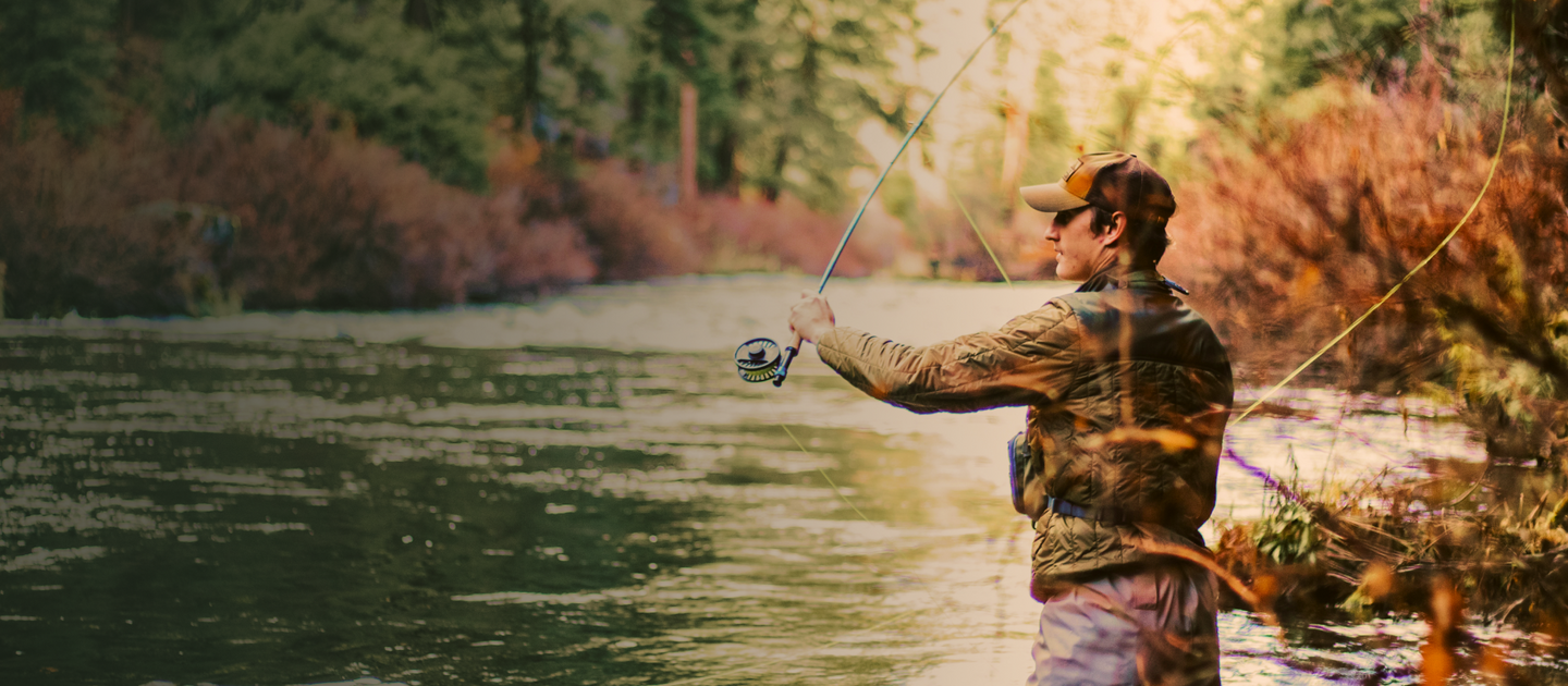 a person fishing in a river