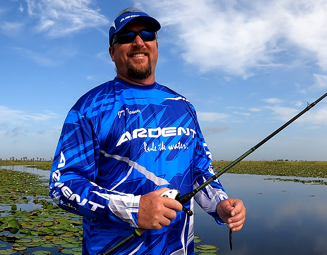 a man holding a fishing pole